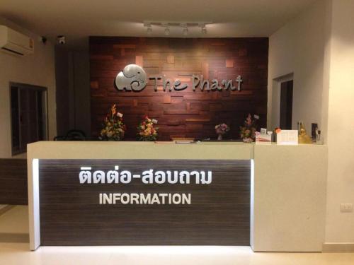 a sign on the front of a building at The Phant Hotel in Surin