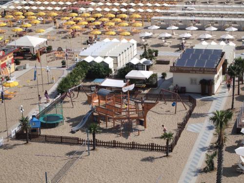 an aerial view of an amusement park with umbrellas at Hotel Maestrale in Riccione