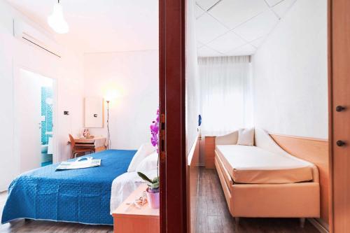 Postel nebo postele na pokoji v ubytování Hotel Bisanzio