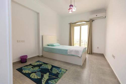 Postel nebo postele na pokoji v ubytování Stylish 3rd Floor Apartment in the Heart of New Cairo