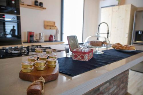 a kitchen counter with a bunch of food on it at Ca' Brazzo Bed Relais in Pontecasale