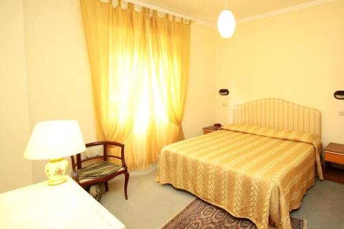 Een bed of bedden in een kamer bij I Fucoli