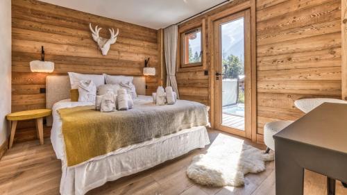 Postel nebo postele na pokoji v ubytování Chalet Hupa