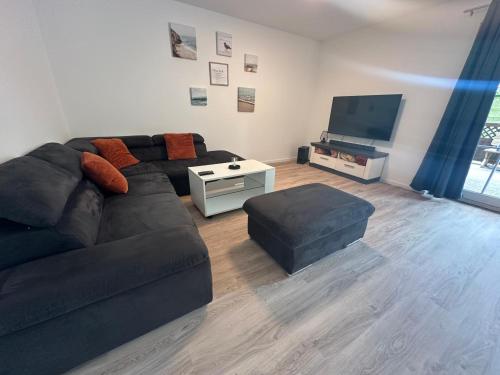 Μια τηλεόραση ή/και κέντρο ψυχαγωγίας στο Ferienhaus Bei Schwarzkopf