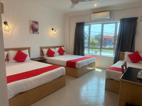 Postel nebo postele na pokoji v ubytování V HOTEL