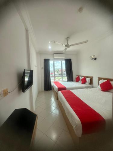 Katil atau katil-katil dalam bilik di V HOTEL