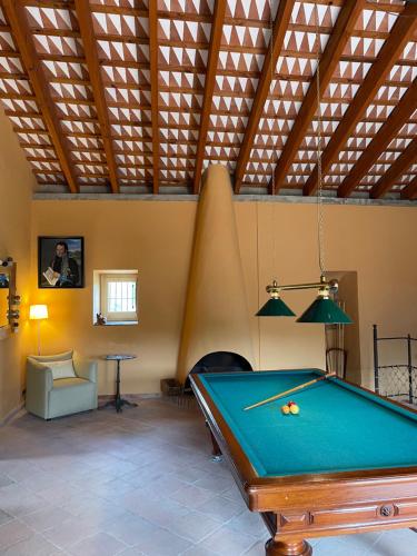 a pool table in a room with a ceiling at Can Clarós in Capmany