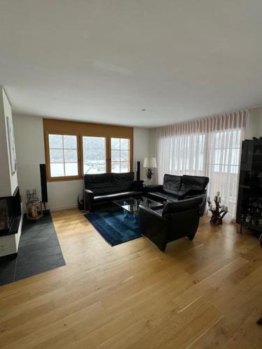 Ein Sitzbereich in der Unterkunft Design Flat Davos