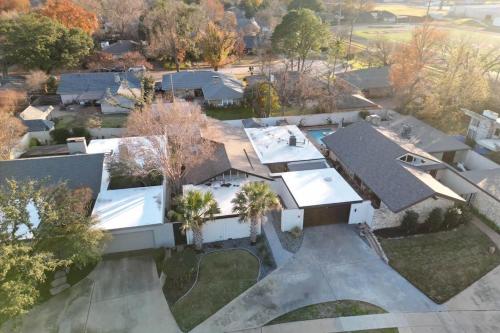an aerial view of a house at West Irving Palace Miami Style in Irving