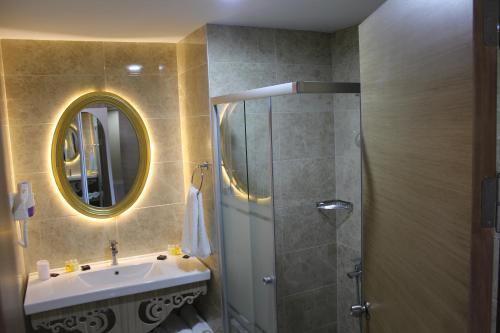 Ванная комната в Hotel La Bella