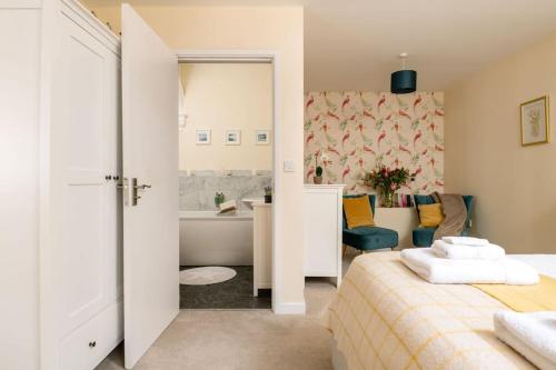 Et badeværelse på Middle Wing - Norfolk Cottage Agency