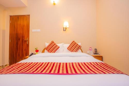Una cama o camas en una habitación de Hotel Liberty