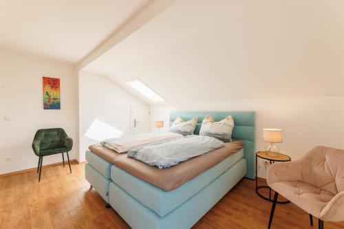 Postel nebo postele na pokoji v ubytování Haus mit wunderschönem Ausblick und Garten