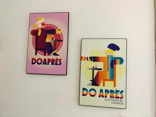 two posters hanging on a wall at Perfect Located Apartment in the heart of Hotham in Mount Hotham