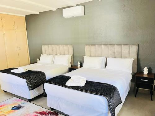 Katil atau katil-katil dalam bilik di Oak Gardens Bed and Breakfast