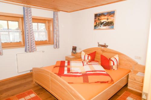 Ein Bett oder Betten in einem Zimmer der Unterkunft Ferienhaus Hanser