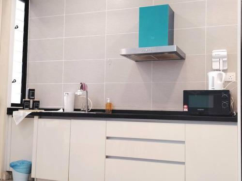 Una cocina o zona de cocina en #T1-13A08 D'Pristine Family Netflix 100mbps bySTAY