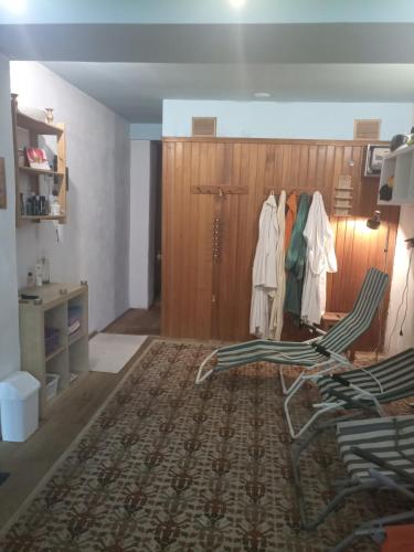 a room with a closet with clothes hanging on it at gemütliche Unterkunft II in Bretsch