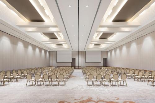 an empty room with rows of chairs in it at Barranquilla Marriott Hotel in Barranquilla