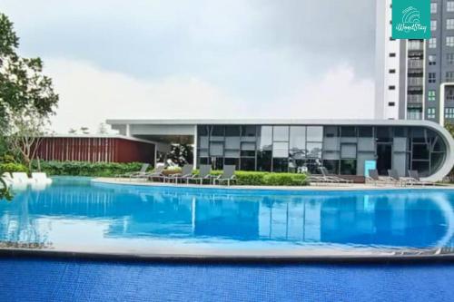 Πισίνα στο ή κοντά στο iWoodStay Mayabay Gamuda Cove Homestay