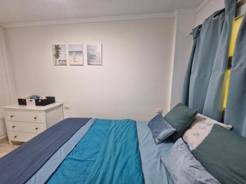 Postel nebo postele na pokoji v ubytování Centric beach front appartment