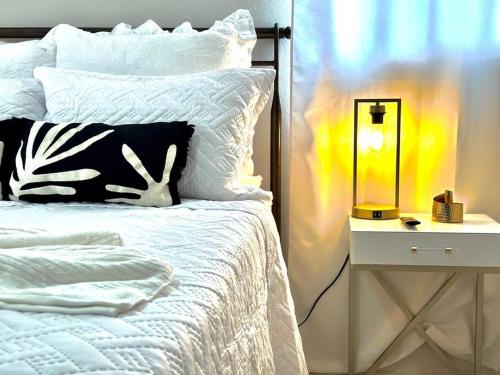 Una cama o camas en una habitación de Gurabo City