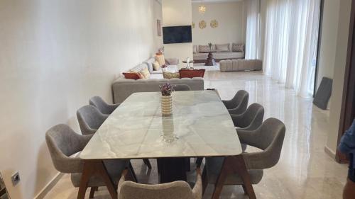 a living room with a table and chairs at Villa Elia in Tamaris