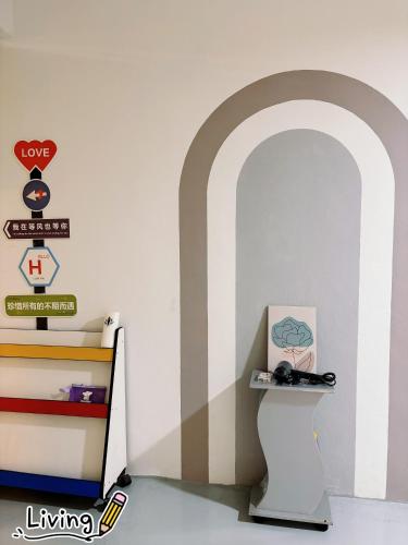 a room with a wall with an archway at Guesthouse Sijangkang Teluk Panglima KSL Klang in Teluk Panglima Garang