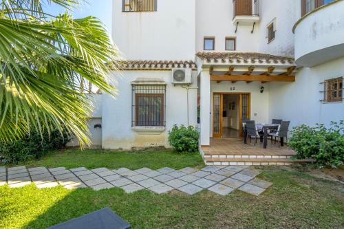 a view of a house with a patio at REFUGIO by the Sea in Orihuela