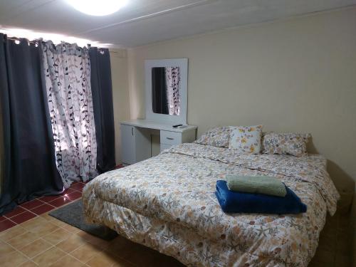 Postel nebo postele na pokoji v ubytování Mi hogar