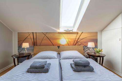 Katil atau katil-katil dalam bilik di SEASIDE APARTMENTS - LIGHTHOUSE LOFt
