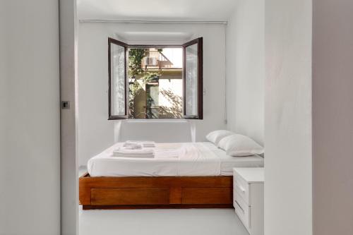 Posteľ alebo postele v izbe v ubytovaní Brera - Bright and cosy 2 bedrooms apt- Via Solferino