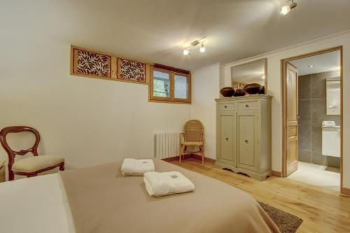 Ένα ή περισσότερα κρεβάτια σε δωμάτιο στο Verve Chalet - Snow and Trek - Morzine