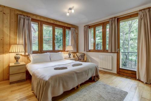 Ένα ή περισσότερα κρεβάτια σε δωμάτιο στο Verve Chalet - Snow and Trek - Morzine