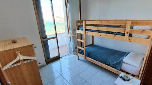 Postel nebo postele na pokoji v ubytování Da Grasso