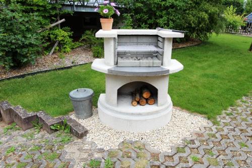 a stone oven with food inside of it at Ferienhaus "Kleine Auszeit" in Pleinfeld
