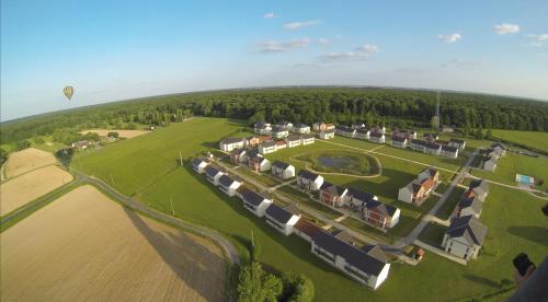 an aerial view of a large estate with a hot air balloon at Villa Bellagio Amboise by Popinns in Amboise