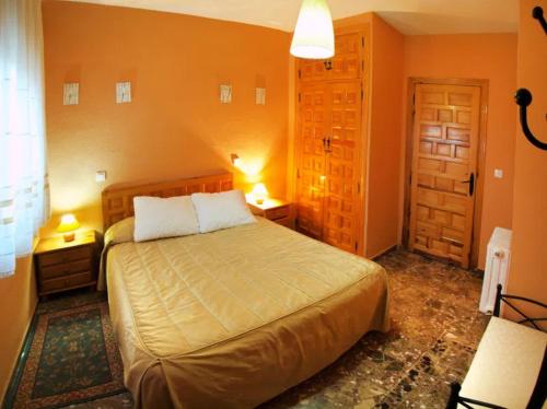 Postel nebo postele na pokoji v ubytování El Mirador de Tórtoles Borrar