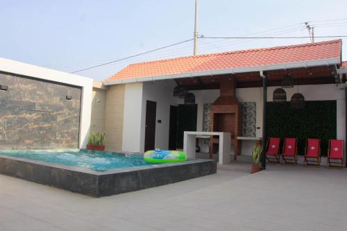 Bazén v ubytování Casa vacional de playa Santorini nebo v jeho okolí