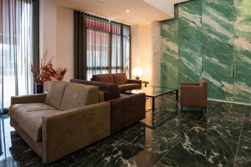 Posezení v ubytování Hotel Bulà