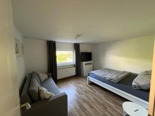 Postel nebo postele na pokoji v ubytování Appartement FlexiHome Garbe