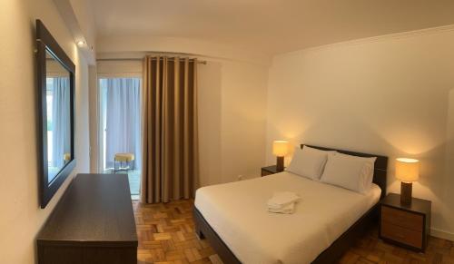 Postel nebo postele na pokoji v ubytování Discovery 1