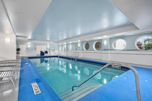 a large indoor swimming pool in a building at Penthouse Beach Villa Ocean Walk Resort Daytona in Daytona Beach