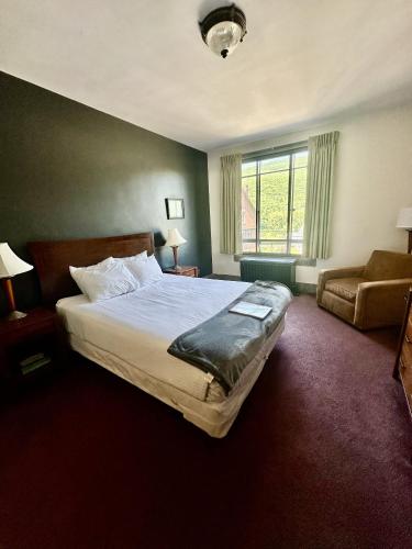 Voodi või voodid majutusasutuse Latchis Hotel toas