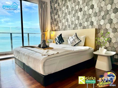 Cama o camas de una habitación en Silver Scape Residence Melaka Raya By Heystay Management