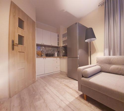 Η κουζίνα ή μικρή κουζίνα στο Willa Mira Jurata apartament z aneksem