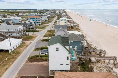 an aerial view of a beach with houses at Shore is Something in North Topsail Beach