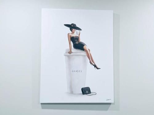 a figurine of a woman in a hat sitting on a wall at Designer 3BDR Penthouse with Private Rooftop Monument Views Near Popular H Street Corridor Parking Included Free Cancellation in Washington
