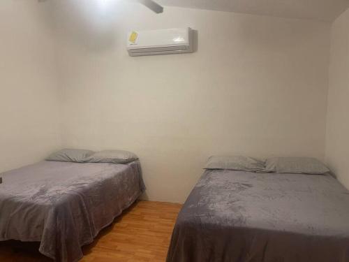 Postel nebo postele na pokoji v ubytování Bonita casa espaciosa en Residencial Montecarlo