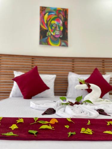 Postel nebo postele na pokoji v ubytování Kendwa Crystal Coast Hotel